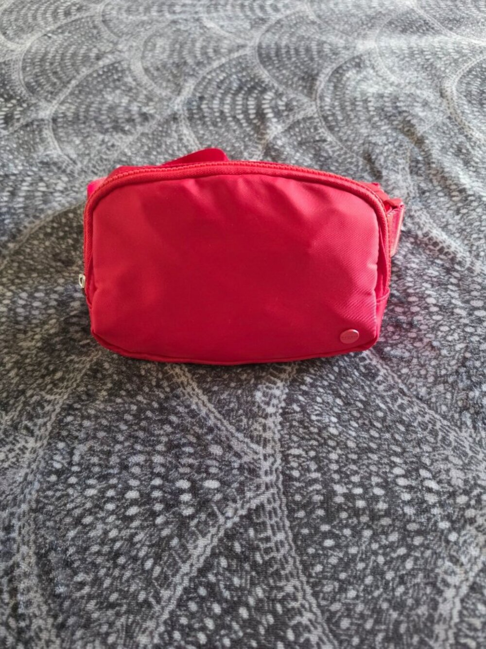 Vibrant Red Studio NYC belt bag is perfect for hands-free convenience.